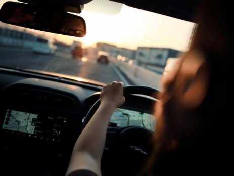 woman driving car with adas